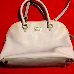 Woman’s purse from Michael Kors.